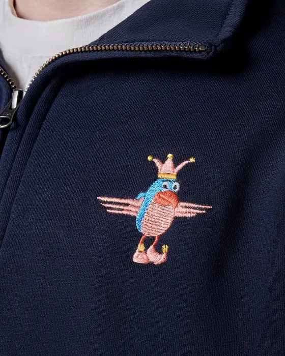 Sudadera azul marino con ilustración de pájaro bordada en el pecho